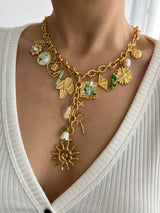 SUNLIT GRACE MULTI CHARM NECKLACE